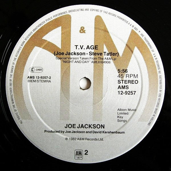 Joe Jackson : Steppin' Out / T.V. Age (12", Maxi)