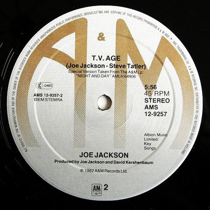 Joe Jackson : Steppin' Out / T.V. Age (12", Maxi)